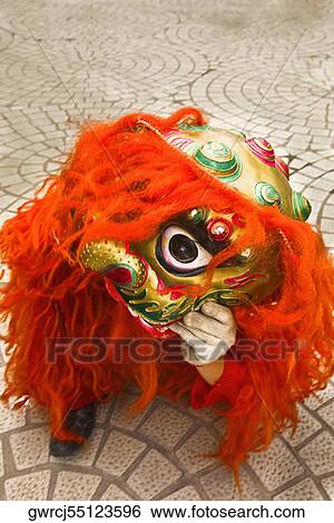 High angle view of a person in Chinese dragon costume, Qingdao, Shandong Province, China View Large Photo Image Stock Photograph - High angle view of a person in Chinese dragon costume, Qingdao, Shandong Province, China. Fotosearch