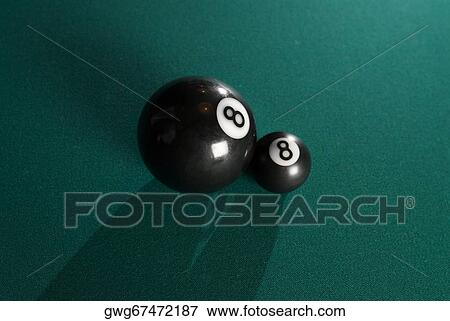 High angle view of two pool eight balls on a pool table View Large Photo Image Stock Photo - High angle view of two pool eight balls on a pool table. Fotosearch