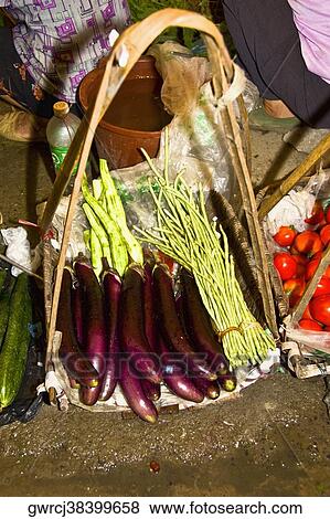 High angle view of vegetables at a market stall, XingPing, Yangshuo, Guangxi Province, China View Large Photo Image Stock Photo - High angle view of vegetables at a market stall, XingPing, Yangshuo, Guangxi Province, China. Fotosearch