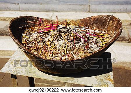 Stock Image - Incenses in a container, Da Zhao Temple, Hohhot, Inner Mongolia, China. Fotosearch