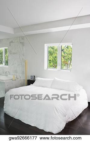 Interiors of a bedroom View Large Photo Image Stock Photo - Interiors of a bedroom. Fotosearch