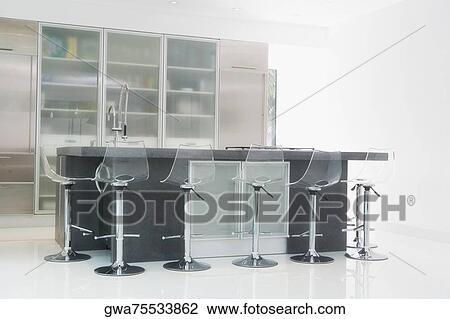 Kitchen in a studio apartment View Large Photo Image Stock Image - Kitchen in a studio apartment. Fotosearch