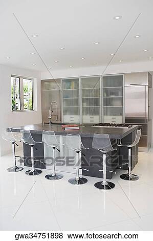 Kitchen in a studio apartment View Large Photo Image Stock Photo - Kitchen in a studio apartment. Fotosearch