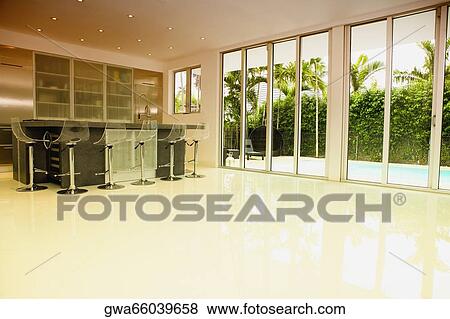 Kitchen in a studio apartment View Large Photo Image Stock Photo - Kitchen in a studio apartment. Fotosearch