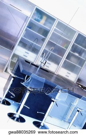 Kitchen in a studio apartment View Large Photo Image Stock Photo - Kitchen in a studio apartment. Fotosearch