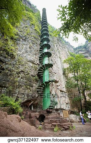 Low angle view of a spiral staircase, Taihang Grand Canyon, Linzhou, Henan Province, China View Large Photo Image Stock Photo - Low angle view of a spiral staircase, Taihang Grand Canyon, Linzhou, Henan Province, China. Fotosearch