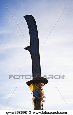 Low angle view of a sword, Inner Mongolia, China View Large Photo Image Stock Image - Low angle view of a sword, Inner Mongolia, China. Fotosearch