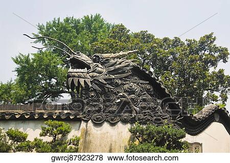 Stock Photo - Low angle view of sculpture of a Chinese dragon, Yu Yuan Gardens, Shanghai, China. Fotosearch