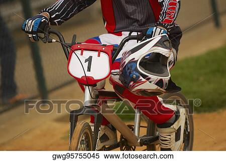 Low section view of a person cycling View Large Photo Image Stock Photography - Low section view of a person cycling. Fotosearch