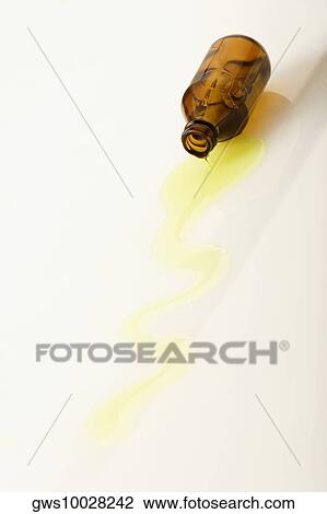 Medicine spilling from a vial View Large Photo Image Stock Image - Medicine spilling from a vial. Fotosearch