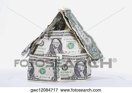Miniature house made up of US dollar bills View Large Photo Image Stock Photo - Miniature house made up of US dollar bills. Fotosearch