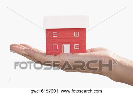 Model home on a palm of a woman View Large Photo Image Stock Image - Model home on a palm of a woman. Fotosearch