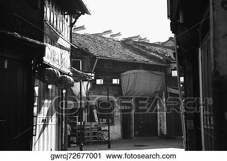 Stock Image - Old houses in a town, Tunxi Old Street, Tunxi District, Anhui Province, China. Fotosearch