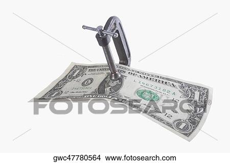 One US dollar bill in a vice View Large Photo Image Picture - One US dollar bill in a vice. Fotosearch