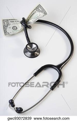 One US dollar bill tied up with a stethoscope View Large Photo Image Stock Photo - One US dollar bill tied up with a stethoscope. Fotosearch