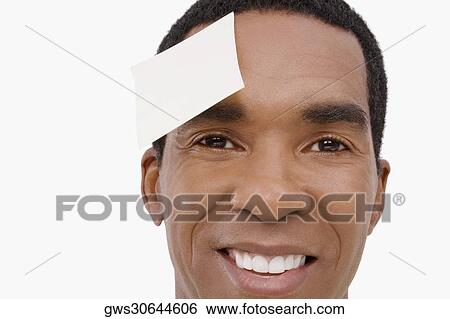 Stock Photograph - Portrait of a businessman smiling. Fotosearch