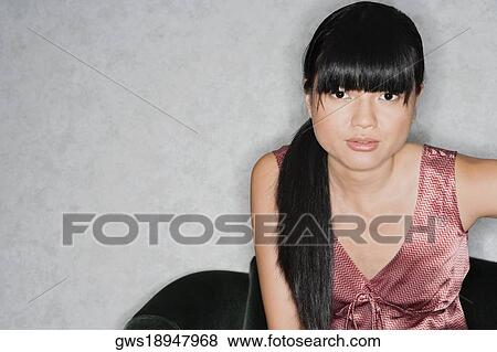 Portrait of a businesswoman thinking View Large Photo Image Stock Photo - Portrait of a businesswoman thinking. Fotosearch