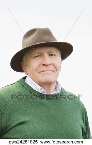 Portrait of a senior man wearing a hat View Large Photo Image Stock Photography - Portrait of a senior man wearing a hat. Fotosearch