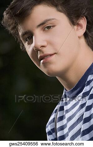 Portrait of a teenage boy smiling View Large Photo Image Stock Photograph - Portrait of a teenage boy smiling. Fotosearch