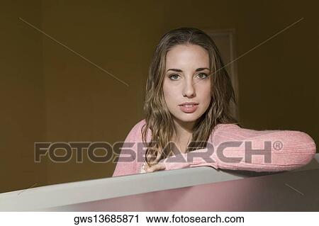 Portrait of a young woman View Large Photo Image Stock Image - Portrait of a young woman. Fotosearch