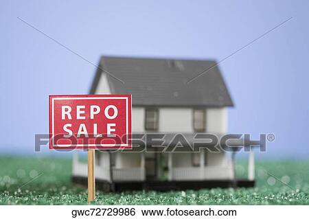 Repo sale sign board in front of a model home View Large Photo Image Stock Photograph - Repo sale sign board in front of a model home. Fotosearch