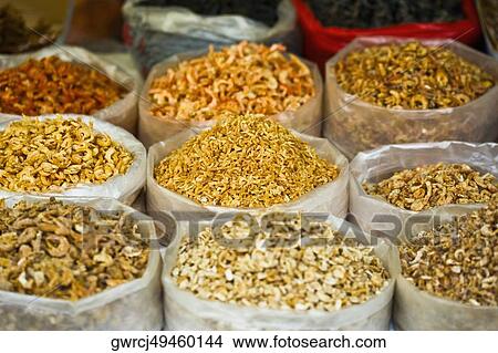 Picture - Sacks of dried shrimps at a market stall, Tai'an, Shandong Province, China. Fotosearch
