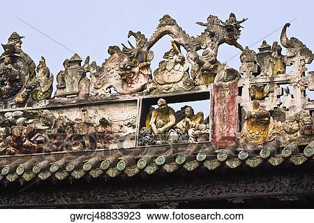 Stock Image - Sculptures on the roof, Chen Clan Academy, Guangzhou, Guangdong Province, China. Fotosearch