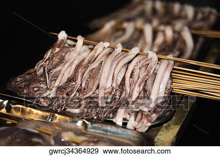 Seafood on skewers at market stall, Nanjing, Jiangsu Province, China View Large Photo Image Stock Photo - Seafood on skewers at market stall, Nanjing, Jiangsu Province, China. Fotosearch