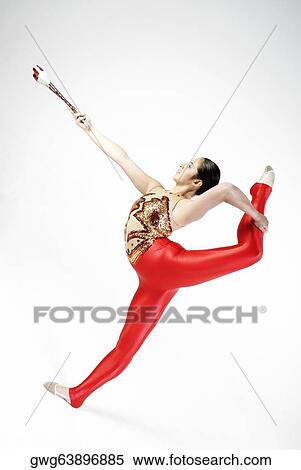 Side profile of a female gymnast practicing View Large Photo Image Stock Photography - Side profile of a female gymnast practicing. Fotosearch