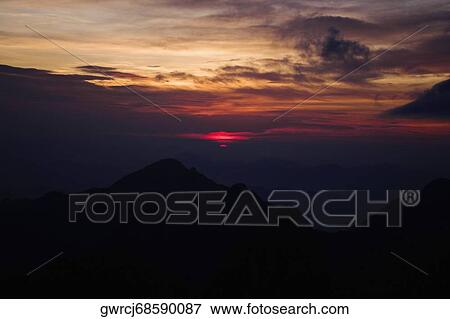 Stock Photo - Silhouette of mountains at dusk, Huangshan Mountains, Anhui Province, China. Fotosearch