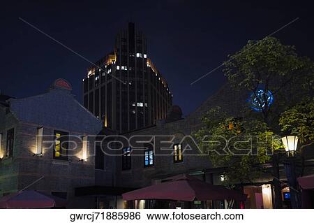 Skyscraper in a city, Xintiandi, Shanghai, China View Large Photo Image Stock Photograph - Skyscraper in a city, Xintiandi, Shanghai, China. Fotosearch