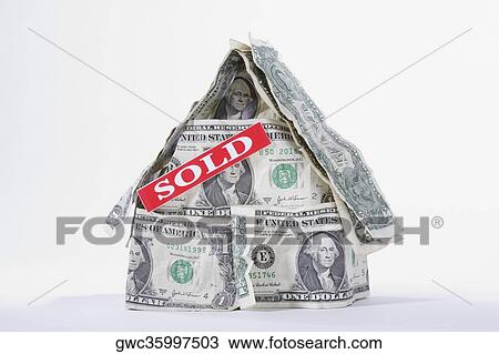 SOLD signboard on a miniature house made up of US dollar bills View Large Photo Image Stock Image - SOLD signboard on a miniature house made up of US dollar bills. Fotosearch
