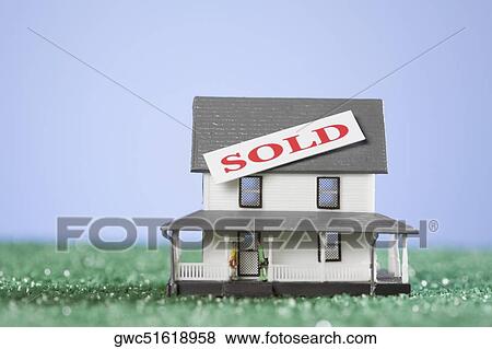 Sold tag on a model home View Large Photo Image Stock Photo - Sold tag on a model home. Fotosearch