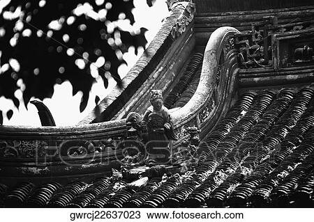 Statue on rooftop, Yu Yuan Gardens, Shanghai, China View Large Photo Image Stock Image - Statue on rooftop, Yu Yuan Gardens, Shanghai, China. Fotosearch