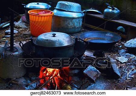 Stewpan on a fire pit, Xingping, Yangshuo, Guangxi Province, China View Large Photo Image Stock Image - Stewpan on a fire pit, Xingping, Yangshuo, Guangxi Province, China. Fotosearch