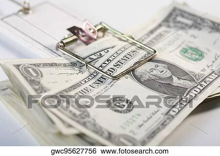 US dollar bills in a mouse trap View Large Photo Image Stock Photograph - US dollar bills in a mouse trap. Fotosearch