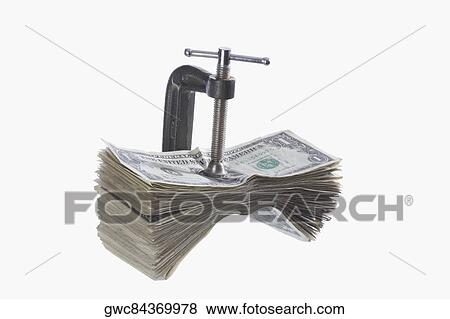 US dollar bills in a vice View Large Photo Image Stock Photo - US dollar bills in a vice. Fotosearch