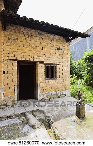 Water pump in front of a house, Yangshuo, Guangxi Province, China View Large Photo Image Stock Image - Water pump in front of a house, Yangshuo, Guangxi Province, China. Fotosearch