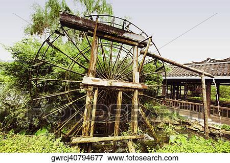 Stock Photo - Watermill in a field, Yangshuo, Guangxi Province, China. Fotosearch