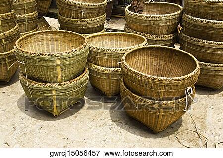 Wicker baskets at a market stall, XingPing, Yangshuo, Guangxi Province, China View Large Photo Image Stock Photo - Wicker baskets at a market stall, XingPing, Yangshuo, Guangxi Province, China. Fotosearch