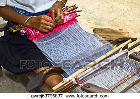 Woman weaving carpet, Jinkeng Terraced Field, Guangxi Province, China View Large Photo Image Stock Photo - Woman weaving carpet, Jinkeng Terraced Field, Guangxi Province, China. Fotosearch
