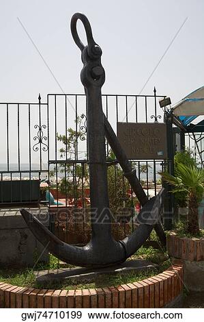 Anchor in front of a railing, Via Partenope, Naples, Naples Province, Campania, Italy View Large Photo Image Stock Photo - Anchor in front of a railing, Via Partenope, Naples, Naples Province, Campania, Italy. Fotosearch