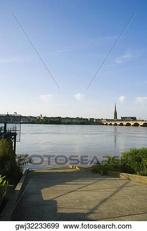 Arch bridge across a river, Pont De Pierre, St. Michel Basilica, Garonne River, Bordeaux, Aquitaine, France View Large Photo Image Stock Photo - Arch bridge across a river, Pont De Pierre, St. Michel Basilica, Garonne River, Bordeaux, Aquitaine, France. Fotosearch