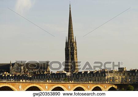 Arch bridge over a river, Pont De Pierre, St. Michel Basilica, Garonne River, Bordeaux, Aquitaine, France View Large Photo Image Stock Image - Arch bridge over a river, Pont De Pierre, St. Michel Basilica, Garonne River, Bordeaux, Aquitaine, France. Fotosearch