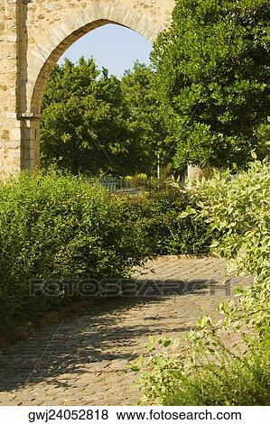Archway of a garden, Le Mans, Sarthe, Pays-de-la-Loire, France View Large Photo Image Stock Photo - Archway of a garden, Le Mans, Sarthe, Pays-de-la-Loire, France. Fotosearch