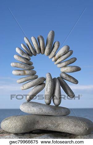 Arranged pebbles on the beach View Large Photo Image Stock Photography - Arranged pebbles on the beach. Fotosearch