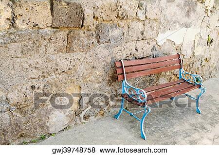 Bench along a stone wall, Sorrento, Naples Province, Campania, Italy View Large Photo Image Stock Photo - Bench along a stone wall, Sorrento, Naples Province, Campania, Italy. Fotosearch