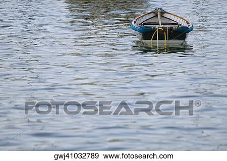 Stock Photo - Boat in the sea, Italian Riviera, Genoa, Liguria, Italy. Fotosearch