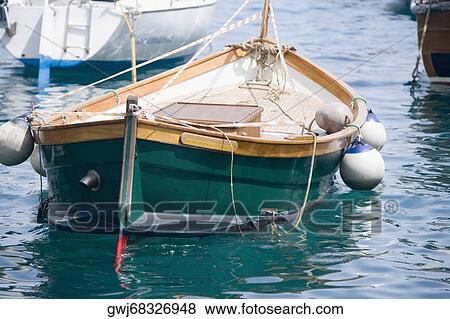 Boat moored at a harbor, Italian Riviera, Santa Margherita Ligure, Genoa, Liguria, Italy View Large Photo Image Stock Photo - Boat moored at a harbor, Italian Riviera, Santa Margherita Ligure, Genoa, Liguria, Italy. Fotosearch
