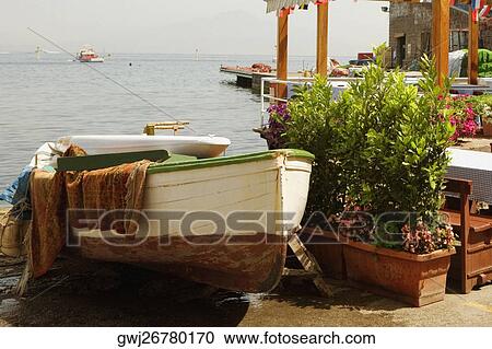 Boat moored at the seaside, Marina Grande, Capri, Sorrento, Sorrentine Peninsula, Naples Province, Campania, Italy View Large Photo Image Stock Image - Boat moored at the seaside, Marina Grande, Capri, Sorrento, Sorrentine Peninsula, Naples Province, Campania, Italy. Fotosearch